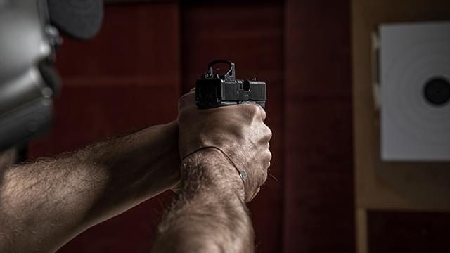 Man shooting pistol