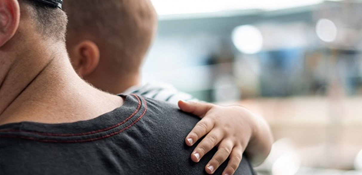man holding child